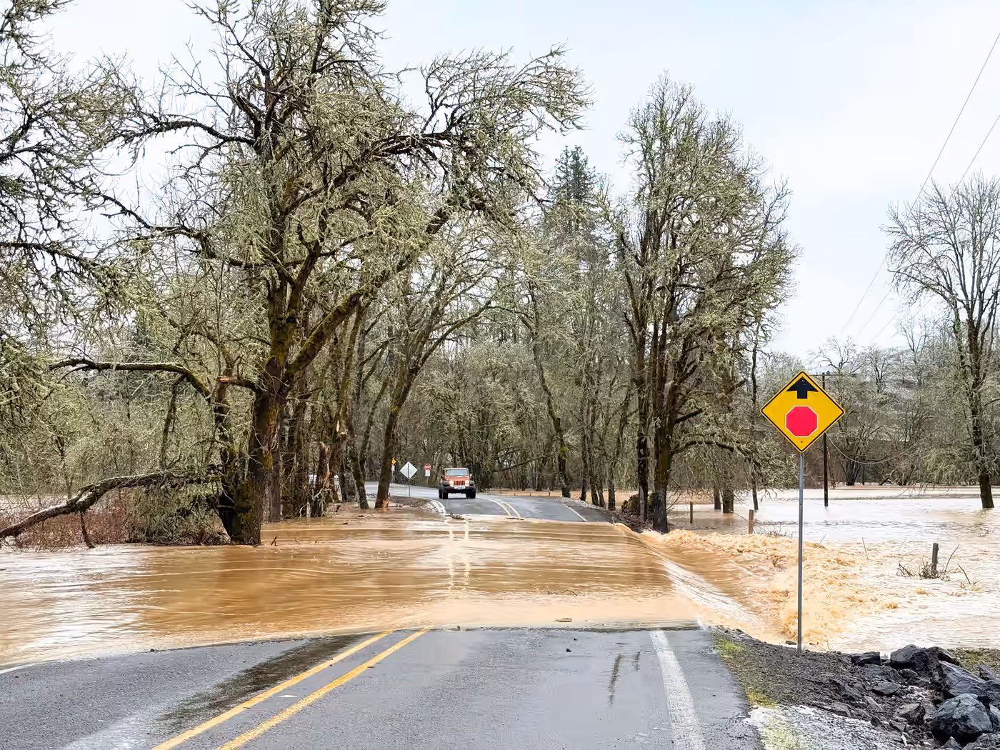 Floodwater covering Rochester Bridge Road near Oakland, Oregon after record rainfall in March 2025 — Aaron Cherry, REALTOR in Roseburg, Oregon
