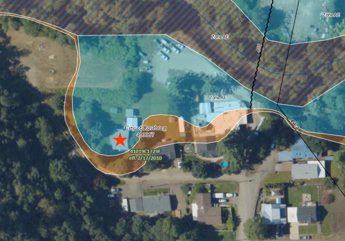 FEMA flood map showing the floodway, 100-year and 500-year flood zones around the pictured Roseburg home