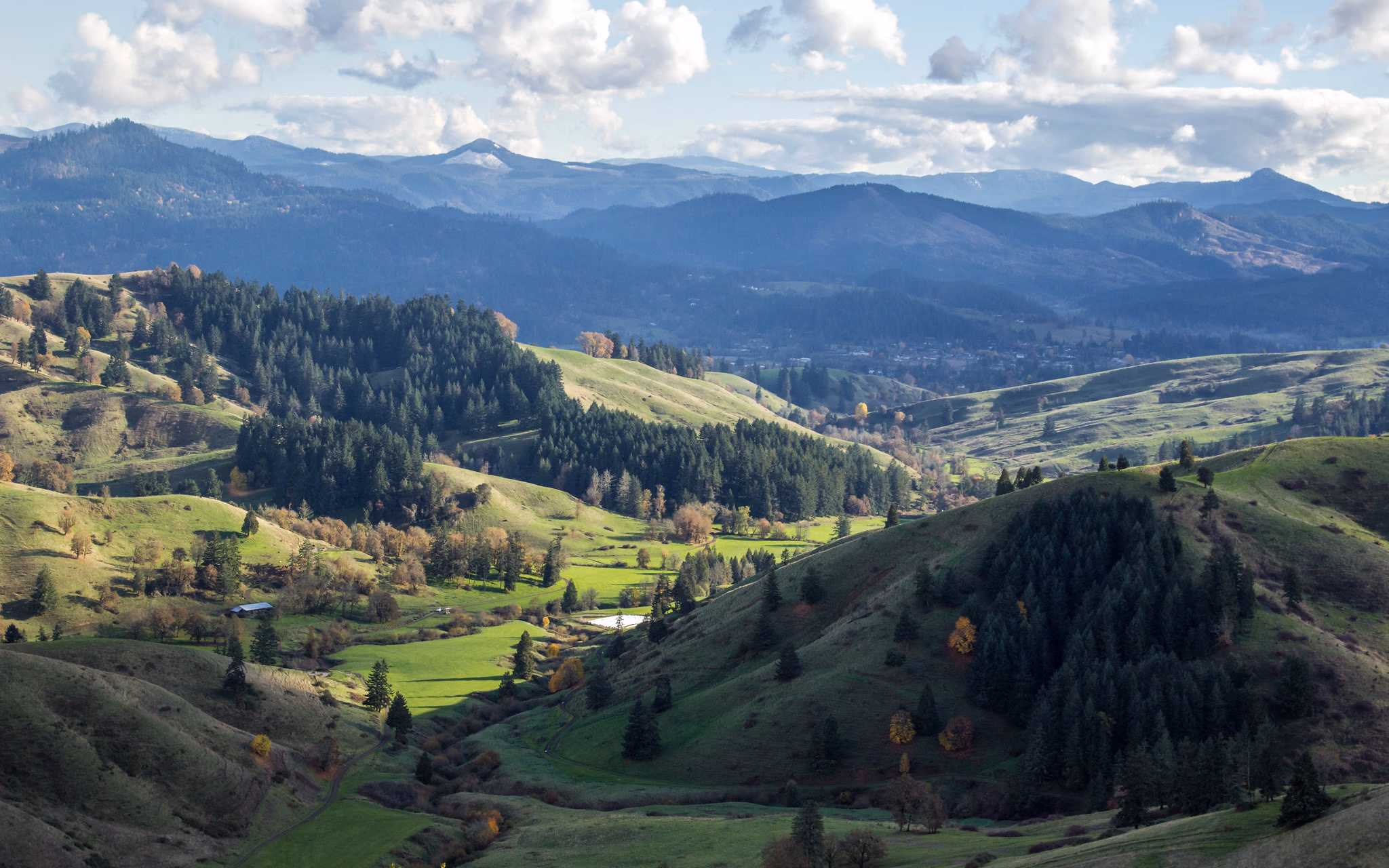 Douglas County valley panorama — green hills and mountains in Southern Oregon, rural land and real estate by Aaron Cherry